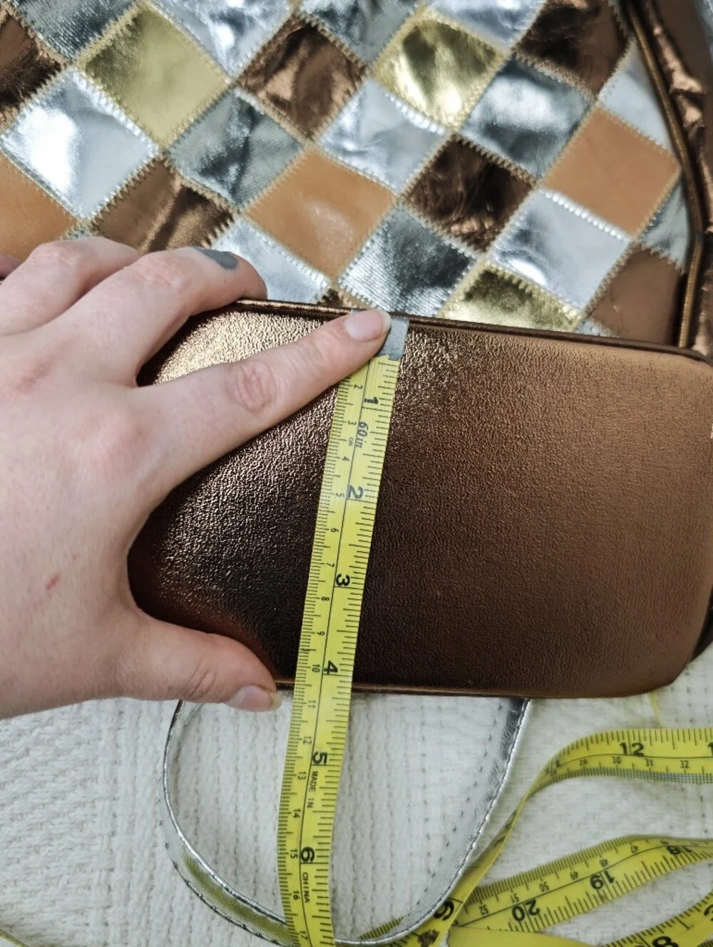 Fifth Avenue Handbags multi metallic leather bucket bag